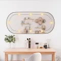Miroir mural avec lumières LED 45x100 cm verre ovale
