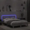 Cadre de lit avec tête de lit et LED gris béton 120x200 cm