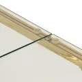 Table basse doré acier inoxydable et verre trempé