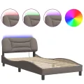 Cadre de lit avec lumières LED taupe 100x200 cm tissu