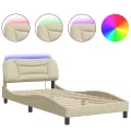 Cadre de lit avec lumières LED crème 100x200 cm tissu