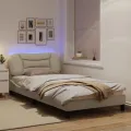 Cadre de lit avec lumières LED crème 100x200 cm tissu