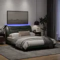 Cadre de lit avec lumières LED gris foncé 140x190 cm tissu