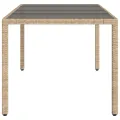Table de jardin avec dessus en verre beige résine tressée