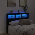 Armoire tête de lit avec LED noir 140x17x102 cm