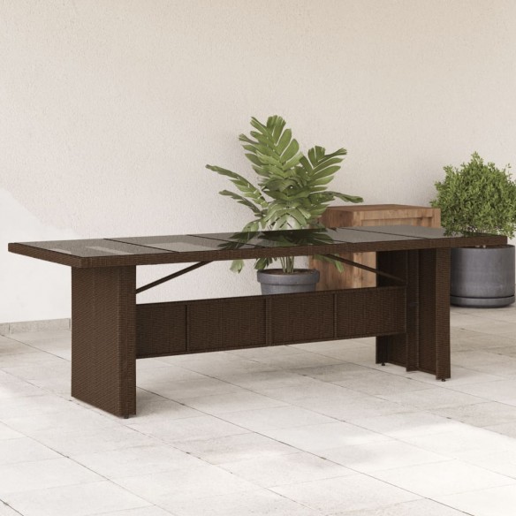 Table de jardin avec dessus en verre marron résine tressée