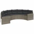Canapé de jardin table coussins demi-rond gris résine tressée