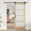 Porte coulissante avec quincaillerie