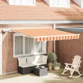 Auvent rétractable manuel avec LED en jaune et orange 350x250 cm